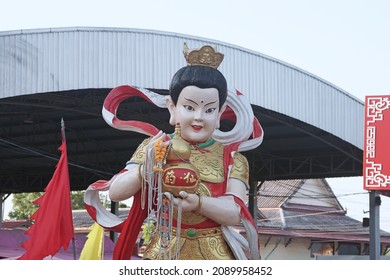 CHACHOENGSAO, THAILAND – DECEMBER 12, 2021: A statue of the Chinese god or Naja god standing at Wat Saman Rattanaram temple in Chachoengsao province.The religious belief in Thailand.