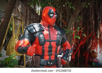 CHACHOENGSAO, THAILAND – FEBRUARY 07, 2021: Deadpool model display on the character by Marvel Comics at Wat Saman Rattanaram Temple in Chachoengsao Province of Thailand.