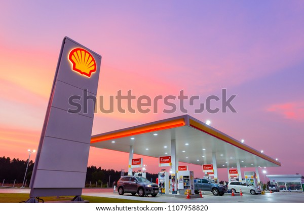 Chachoengsao,\
Thailand - Jan 28, 2018: Shell gas station blue sky background\
during sunset. Royal Dutch Shell sold its Australian Shell retail\
operations to Dutch company Vitol in\
2014