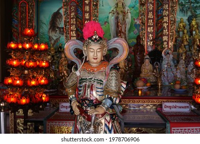 CHACHOENGSAO, THAILAND – MAY 23, 2021: A statue of the Chinese god standing at shrine in Wat Saman Rattanaram temple in Chachoengsao province.Beliefs of Chinese Thais in Thailand.