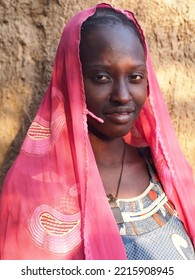 Chad, Sahel, Africa, August 5 2020, Portrait Of A Black African Muslim Girl In A Village In The Sahel