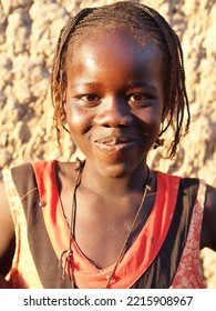 Chad, Sahel, Africa, August 5 2020, Portrait Of A Black African Muslim Girl In A Village In The Sahel