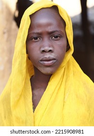 Chad, Sahel, Africa, August 5 2020, Portrait Of A Black African Muslim Girl In A Village In The Sahel