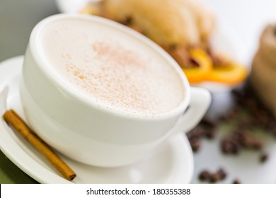 Chai tea latte withcranberry orange fresh scone for breakfast.