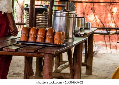 Chai Time.  Photograph of kulhads in which hot tea is served and a tea filled utensil. 