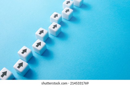 Chain of arrows blocks. Consistency and focus. Concept of conformism, vertical of power. Unchanging course of development. Education and skill growth. Building a solid strategy. - Shutterstock ID 2145331769