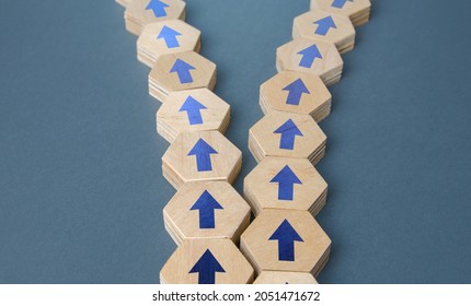 The chain with arrows splits into two. Concept of conflict. Division of business company. Splitting opinions on an issue. Rivalry, competition. Walk your own ways. Discrepancies, variance