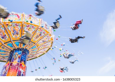Chain carousel ride in an amusement parks carnivals or funfair, Munich, German