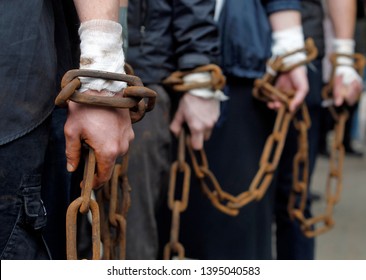 Chain On Hands Of Chained Together Men Close Up