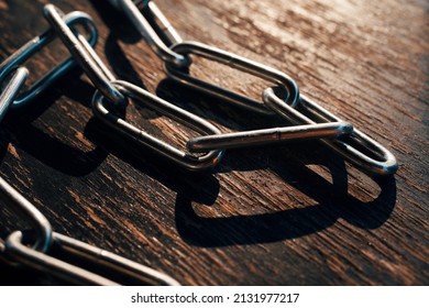 The chain on an old wood background