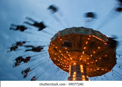 Chain Swing Ride In Amusement Park