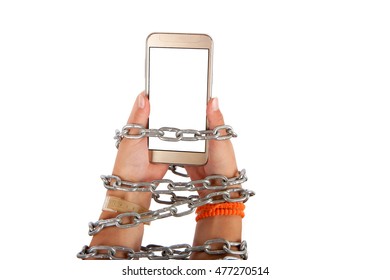 Chained hands of a child holding a smartphone with white screen. Smartphone, Internet addiction concept. Studio isolated on white background.