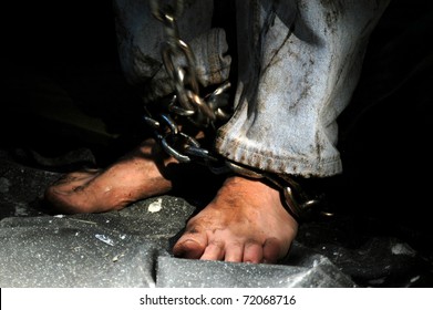 Chained person.
