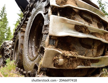 Chained Wheels Of Heavy Forestry Machine.