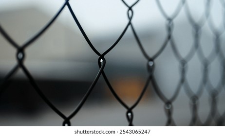 Chain-link mesh close-up, metal fencing, fog, pattern - Powered by Shutterstock