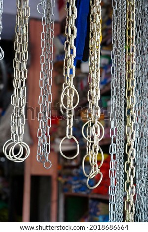 chains hanging forsale in a street market