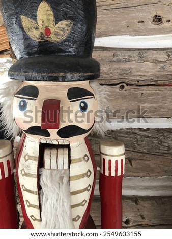 Chainsaw carved nutcracker. Made by Joel Fawcett of Chesterville Ontario in front of old log barn.
