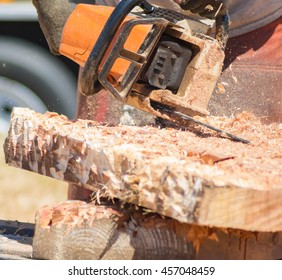 Chainsaw Carving Wood With Flying Wood Chips