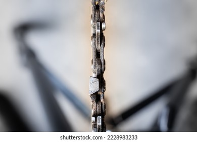 Chainsaw chain on the tire close-up. Saw teeth for cutting wood on a blurred background. Agricultural tool