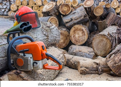 Chainsaw Split Tree Trunk With Safety Helmet