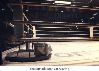 chair, bucket, towel and tray put on a corner of boxing ring - Powered by Shutterstock