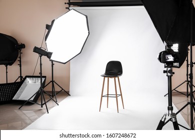 Chair And Equipment In Modern Photo Studio