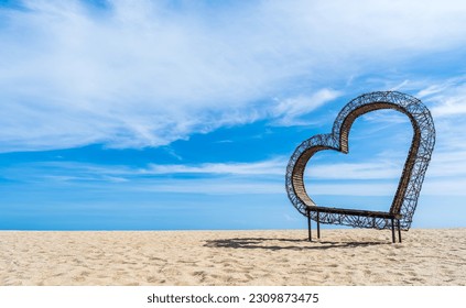 Chair heart shape on sand beach on daylight well free space for text with love sign or valentines on blue sky white clouds background  - Powered by Shutterstock