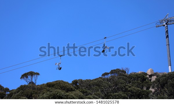 Chair\
lift cable car mountain railway in the\
mountains
