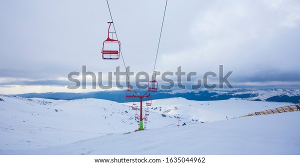 chair lift for ski\
slope in the mountain