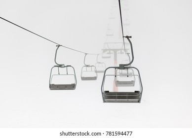 The Chair Lift In Thick Fog