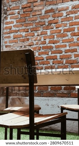 chair with table at abstrack background