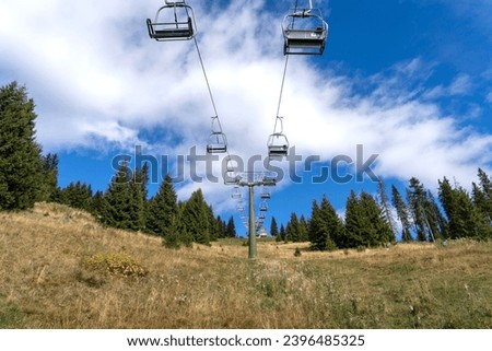 Chairlift on the Alpe di Siusi, Dolomites, mountains in South Tyrol, Italy