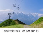 Chairlift  on Mont Blanc. Chairlift wires on a mountain - view from the ground.