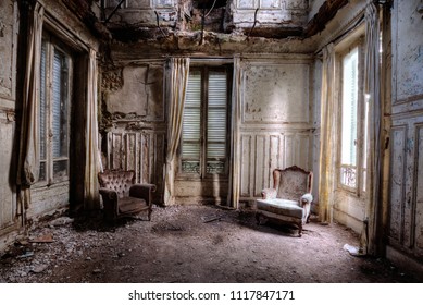 Chairs in an abandoned room in france - Shutterstock ID 1117847171