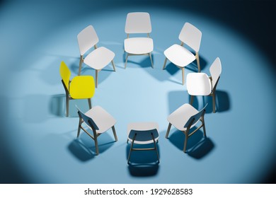 Chairs In A Circle In An Empty Dark Studio Room. One Chair Stands Out. The Concept Of Leadership And Individuality