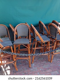 Chairs Collected And Secured For The Night After The Dinner Shift Of A Restaurant