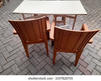 Chairs And Dining Table Made Of Wood In The Restaurant Courtyard. Restaurant Interior Background Concept, Decoration, Exterior, Cafe, Work, Worker, Furniture, Vintage, Ancient, Lifestyle, Hanging Out