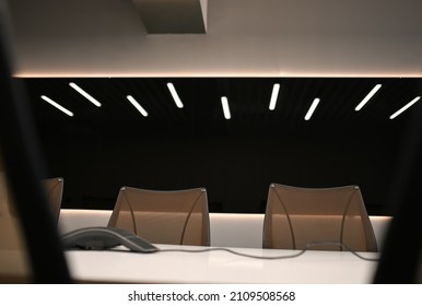 Chairs Inside An Empty Office Meeting Room With Dark Background And Beautiful Details.