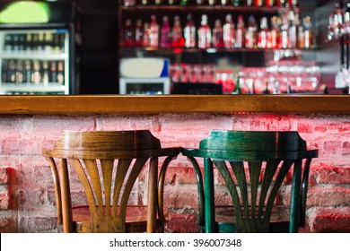 Chairs in modern cafe bar, blurred background, no people