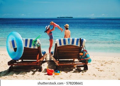 chairs on tropical beach, family beach vacation