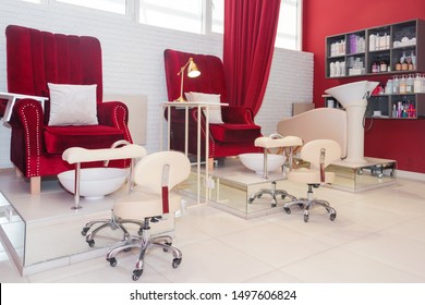 Chairs In A Pedicure Beauty Salon. Interior Of Empty Modern Nail Salon. Work Places For Masters Of Manicure. Pedicure Cabinet.