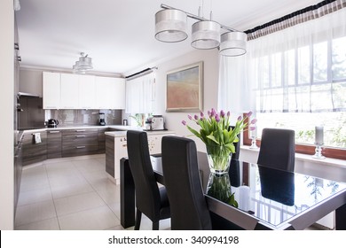 Chairs And Table In A Dining Room 