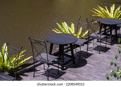 Chairs And Table On The Backyard In Tropical Garden Near Lake With Beautiful View In Island Borneo, Malaysia, Close Up