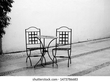 chairs and table on the terrace - Shutterstock ID 1473786683