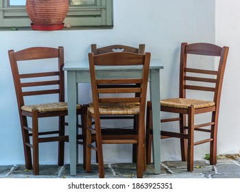 Chairs And Table Outside Of A Taverna