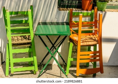 Chairs And Table Outside Of A Taverna