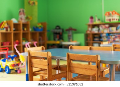 Chairs, Table And Toys. Interior Of Kindergarten.