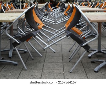 Chairs And Tables In Front Of Restaurant Outdoor On Rainy Day