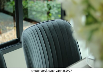 
Chairs With Velvet Texture, Curtains And Table In Modern Dining Room. Natural View From Aluminum Framed Glass Windows Or Door. Luxury Furniture For Interior Design, Home, Living Website. Yard Garden