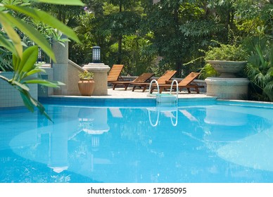 chaise longue and swimming-pool